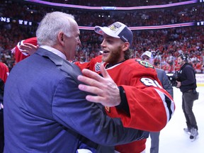 Chicago Blackhawks right wing Patrick Kane (88) hugs head coach Joel Quenneville (left) after defeating the Tampa Bay Lightning in game six of the 2015 Stanley Cup Final at United Center. (Dennis Wierzbicki-USA TODAY Sports)