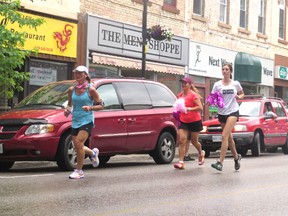 Cancer survivor Theresa Carriere passing by Strathroy during her OneRun event to raise money to fund cancer programs.