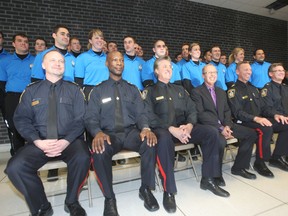 A file photo shows the 2011 police cadet class. There are now about 40 cadets, well short of around 60-plus needed just to staff basic police services, said Hofley. Fifteen more are in training.