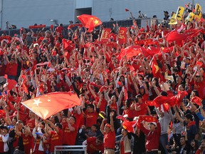 China fans celebrate a penalty-spot goal against New Zealand during the FIFA Women's World Cup Canada 2015 in Winnipeg on Mon., June 15, 2015. Kevin King/Winnipeg Sun/Postmedia Network