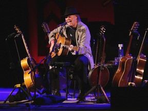 Neil Young in concert at Massey Hall  in Toronto, Ont. on Sunday January 12, 2014. Craig Robertson/Postmedia Network