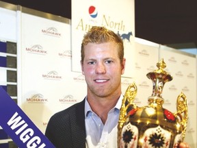 Peter Holland of the Toronto Maple Leafs poses for a photo with the Pepsi North America Cup. (NEW IMAGE MEDIA)