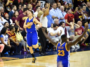 Golden State Warriors guard Klay Thompson celebrates during the fourth quarter of Tuesday night's win over the Cleveland Cavaliers. (USA TODAY SPORTS)