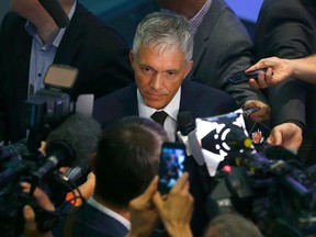 Swiss Attorney General Michael Lauber (C) speaks to media following a news conference in Bern, Switzerland June 17, 2015. The Swiss attorney general said on Wednesday his office has seized around nine terabytes of data as part of an major investigation into suspected irregularities in the allocation of the FIFA World Cups of 2018 and 2022. "Our investigation is of great complexity and quite substantial. To give you an example, the OAG (Office of the Attorney General) has seized around nine terabytes of data," Lauber said.  (REUTERS/Ruben Sprich)