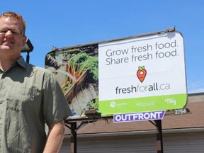 Samantha Reed/The Intelligencer
Steve van de Hoef, Chair of the Food Security Network of Hastings and Prince Edward Counties, stands in front of the new Fresh For All billboard on North Front Street. The program works to bring to provide food banks and community food programs with more produce.