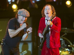 Brian Johnson, left, and Angus Young of the Australian band AC/DC play at the Coachella Valley Music and Arts Festival in Indio, Calif., on April 10, 2015. (Lucy Nicholson/Reuters)