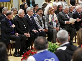 Anglican Primate Fred Hiltz (L), Catholic Archbishop Gerard Pettipas, Prime Minister Stephen Harper, Inuit National President Terry Audla, Assembly of First Nations National Chief Perry Bellegarde, Justice Murray Sinclair, and Governor General David Johnston attend the Truth and Reconciliation Commission of Canada's closing ceremony at Rideau Hall in Ottawa June 3, 2015. REUTERS/Blair Gable