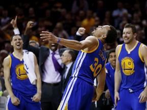 Stephen Curry and the Warriors ran with the blueprint that puts the emphasis on jump shooting and defensive versatility. (AFP/PHOTO)