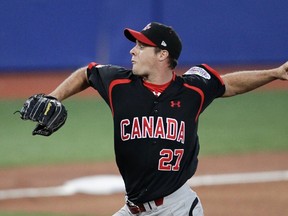 Canada pitcher Andrew Albers throws to the U.S. during the gold-medal baseball game at the Pan American Games in Lagos De Moreno, Mexico, on Oct. 25, 2011. (HENRY ROMERO/Reuters files)