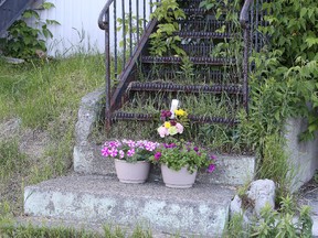 In this file photo, a memorial is set up in front of the Beech Street rooming house where Gary Triff was beaten. He later died from his injuries. Gino Donato/Sudbury Star