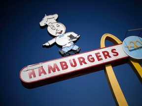 The signage outside a historic McDonald's restaurant is seen in Downey, California, in this file photo taken February 18, 2015. (REUTERS/Lucy Nicholson/Files)