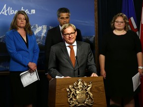 Minister of Education David Eggen comments on Bill 3, the Appropriation (Interim Supply Act) that reverses cuts to health care and invests in public services during a news conference at the Alberta Legislature on Thursday, June 18, 2015. Perry Mah/Edmonton Sun