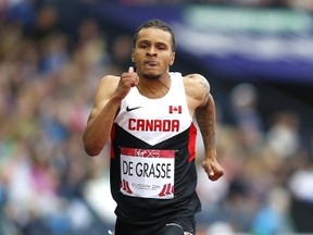 Canada's Andre De Grasse competes in the heats of the men's 200m during the 2014 Commonwealth Games in Glasgow, Scotland on July 30, 2014. (Adrian Dennis/AFP)