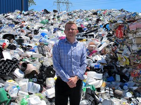 Derek Ochej, a city public education and promotion coordinator, at the Kingston Area Recycling Centre. (Sebastian Leck/For The Kingston Whig-Standard)