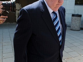 Senator Mike Duffy departs the Ottawa Courthouse in Ottawa, Ont. on Monday June 1, 2015. Errol McGihon/Postmedia Network