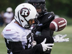 Ottawa RedBlacks WR Chris Williams pulls in a pass during an intersquad game at the Mont Bleu Sports Complex in Gatineau on Wednesday June 17, 2015. Errol McGihon/Ottawa Sun/Postmedia Network