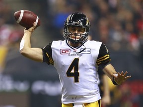 Tiger-Cats QB Zach Collaros sprints out looking for the open receiver during last year’s Grey Cup game in Vancouver. (AFP/PHOTO)