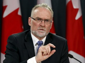 Auditor General Michael Ferguson speaks at a news conference about the auditor general's report on Senate expenses on June 9. (REUTERS/Patrick Doyle)
