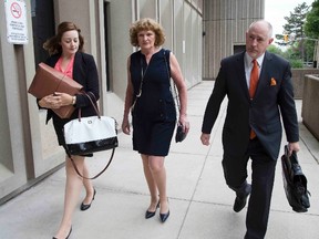 Ruth Burger and her legal team arrive at the London courthouse on Friday June 19, 2015. (Derek Ruttan, The London Free Press/Postmedia Network)