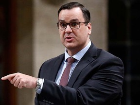 Industry Minister James Moore speaks during Question Period in the House of Commons on Parliament Hill in Ottawa Nov. 26, 2014. REUTERS/Chris Wattie