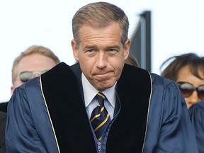 NBC News anchor Brian Williams prepares to receive an honorary doctorate in humane letters from George Washington University in Washington, in this file photo taken May 20, 2012. (REUTERS/Jonathan Ernst/Files)