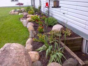 Rain gardens are beautiful and very effective in allowing water to absorb quickly into the ground.