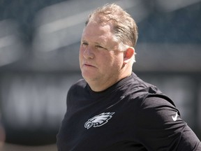 Head coach Chip Kelly of the Philadelphia Eagles watches his team warm up prior to the game against the Jacksonville Jaguars on September 7, 2014 at Lincoln Financial Field. (Mitchell Leff/Getty Images/AFP)