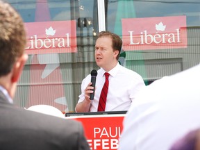 Paul Lefebvre, federal Liberal candidate for Sudbury, addresses a crowd at the opening of his campaign office on Barrydowne Road in Sudbury, Ont. on Friday June 19, 2015. John Lappa/Sudbury Star/Postmedia Network