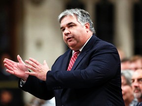 Government House Leader Peter Van Loan speaks during Question Period in the House of Commons on Parliament Hill in Ottawa, Sept. 30, 2014. (CHRIS WATTIE/Reuters)