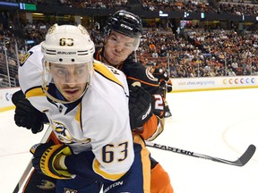 Predators centre Mike Ribeiro (left) is being accused of sexually assaulting his nanny. (Jake Roth/USA TODAY Sports/Files)