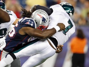 Jermaine Cunningham, left, seen here as a member of the New England Patriots, has been sentenced to probation by a New Jersey court in a "revenge porn" case. (REUTERS/Jessica Rinaldi)