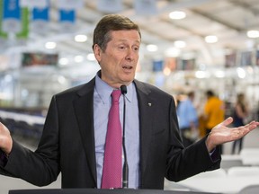 Toronto Mayor John Tory addresses the media at the dining hall at the CIBC Pan Am/Parapan Am Athletes’ Village in Toronto, Ont. in Toronto, Ont. on Friday June 19, 2015. Ernest Doroszuk/Toronto Sun/Postmedia Network