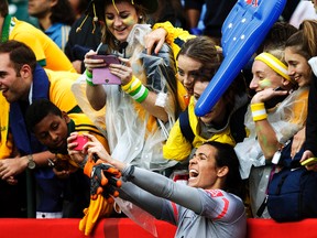 Australia's Lydia Williams greets fans after tying Sweden during a FIFA Women's World Cup match at Commonwealth Stadium on June 16, 2015. (Ian Kucerak/Edmonton Sun/Postmedia Network)
