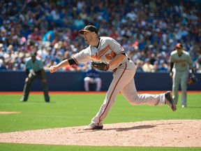 After the Blue Jays loaded the bases to begin the bottom of the eighth against Darren O’Day, the Baltimore reliever struck out the next three batters to keep the score tied. (NICK TURCHIARO/USA Today Sports)