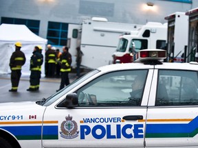 Police and Hazmat teams investigate after a raid at warehouse  in Vancouver, British Columbia, in this 2011 file photo.  (CARMINE MARINELLI/POSTMEDIA NETWORK FILE)