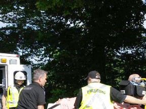 Paramedics take a man to hospital after he became trapped in a rock crevice near Singhampton for about 14 hours.
CHERYL BROWNE/BARRIE EXAMINER