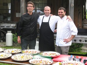 Chef Mike Genovy, centre, is the head chef at this year's Food Day Canada Farm Dinner in Lambton County. He's pictured at last year's dinner at Twin Pines Orchard and Cider House with Dave Duguay, left, and Rob Pruliere. (Handout)
