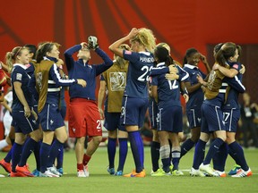 France squad celebrates the 3-0 victory against Korea Republic following the second half in the round of sixteen in the FIFA 2015 women's World Cup soccer tournament at Olympic Stadium. (Jean-Yves Ahern-USA TODAY Sports)