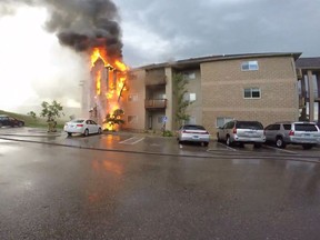 The Rapid City apartment complex on fire. 

(YouTube/SpencerButler)