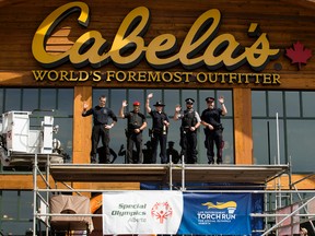 (left to right) Corrections Officer Sheridan Taylor, Military Police Officer Fred Savard, Sheriff Dennette Harrison, Peace Officer Steve Schmidt, and EPS Cst. Ryan May are camping on the roof of Cabela's (6150 Currents Drive) for 53 hours as part of a the Free The Fuzz fundraiser for the Special Olympics. David Bloom/Edmonton Sun/Postmedia Network