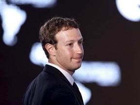 Facebook CEO Mark Zuckerberg asks a question during the II CEO Summit of the Americas on the sidelines of the VII Summit of the Americas in Panama City April 10, 2015. REUTERS/Carlos Garcia Rawlins