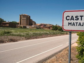 A sign with the name of the village of Castrillo Matajudios (Kill Jews Fort) is seen near its entrance in northern Spain May 16, 2014.   REUTERS/Ricardo Ordonez