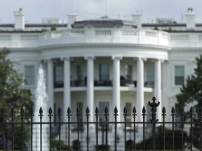 The original South Lawn security fencing is seen at the White House in Washington May 28, 2015.  REUTERS/Gary Cameron