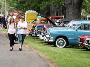 Visitors check out the classic cars at the 11thannual Sombra Optimist Car Show on Saturday at Brander Park.