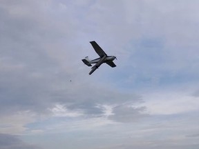 A plane involved in a fatal crash near Fort McMurray here landing safely. The pilot wasn't hurt. (YouTube screen capture)