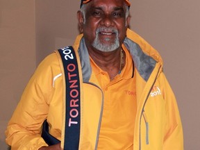 Ramesh Jagoo, 70, is pictured in his Bright's Grove home with his Toronto 2015 Pan Am and Parapan Am Games volunteer apparel on Tuesday June 16, 2015 in Sarnia, Ont. Terry Bridge/Sarnia Observer/Postmedia Network