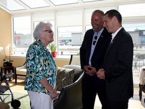 SARAH HYATT/THE INTELLIGENCER
Ontario's Conservative leader Patrick Brown (right) and Prince Edward-Hastings MPP Todd Smith are greeted by Hilda Denyes at Quinte Gardens retirement home in Belleville Monday.