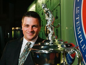 New Marlies coach  Sheldon Keefe with the coach of the year trophy he won for his coaching job with the Sault Ste. Marie Greyhounds at the OHL  awards ceremony. (Stan Behal/Toronto Sun)