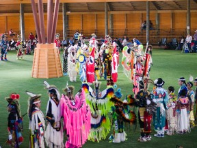 The grand entry at the Piikani Youth Powwow was a bright affair. Roughly 100 First Nations dancers and drummers took part in the event with another 400 community members and spectators in attendance on June 20, 2015. John Stoesser photos/Pincher Creek Echo.