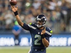 Seahawks quarterback Terrelle Pryor passes the ball during second half action against the Chargers in Seattle on Aug. 15, 2014. Pryor was claimed by the Browns on waivers on Monday. (Steven Bisig/USA TODAY Sports)